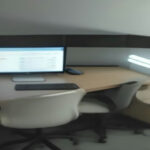 Dual monitor workplace setup displaying modern freelance workflow tools and digital project management software.