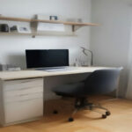 Modern freelancer workspace with laptop and smartphone setup for account verification and digital work.