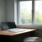 Laptop open on a modern desk during an online work platform registration process.