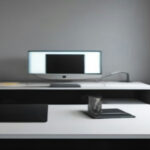 Minimalist remote work desk with a laptop prepared for an AI video interview screening.
