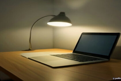 Modern remote work setup with laptop open for online tutor interview preparation.