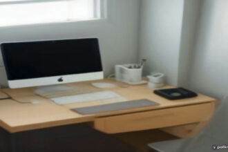Home office workspace set up for virtual call center customer support work on a laptop.