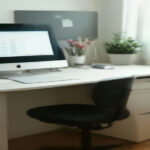 A minimalist home office workspace setup with a laptop displaying research data, suitable for online participant tasks.