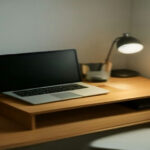 Freelance workspace displaying digital work management and proposal tools on a laptop screen.