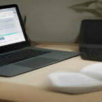 A modern remote workspace setup showing a laptop ready for online data annotation and AI model testing tasks.