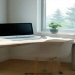 Minimalist remote home office setup with laptop prepared for search engine evaluator testing.