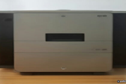 A modern home-lab mini server connected to networking gear for Docker container hosting.
