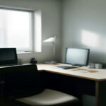 A laptop resting on a wooden desk displaying network analytics in a modern minimalist home office.